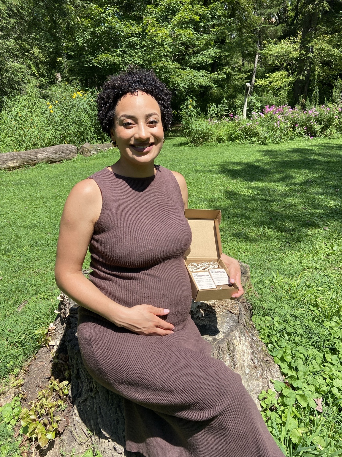 Kayla smiling with Ginger Bean™ gift box